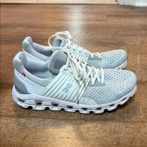 On Running Light Gray and White Athletic Shoes